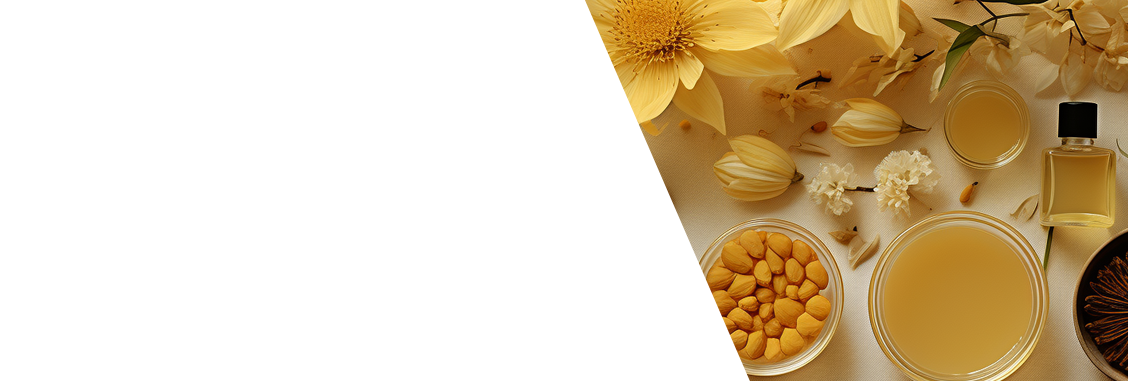 Decorative scene with yellow flowers, fruits, and a bottle on a white background