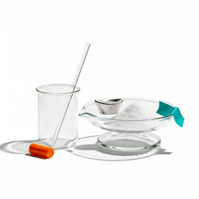 Clear glass kitchenware items on a white background