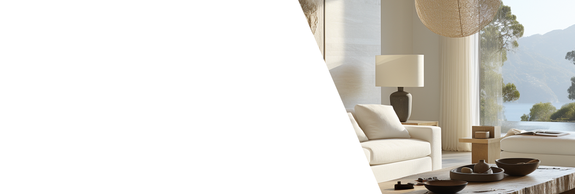 Modern living room with a white armchair, lamp, and decorative items.